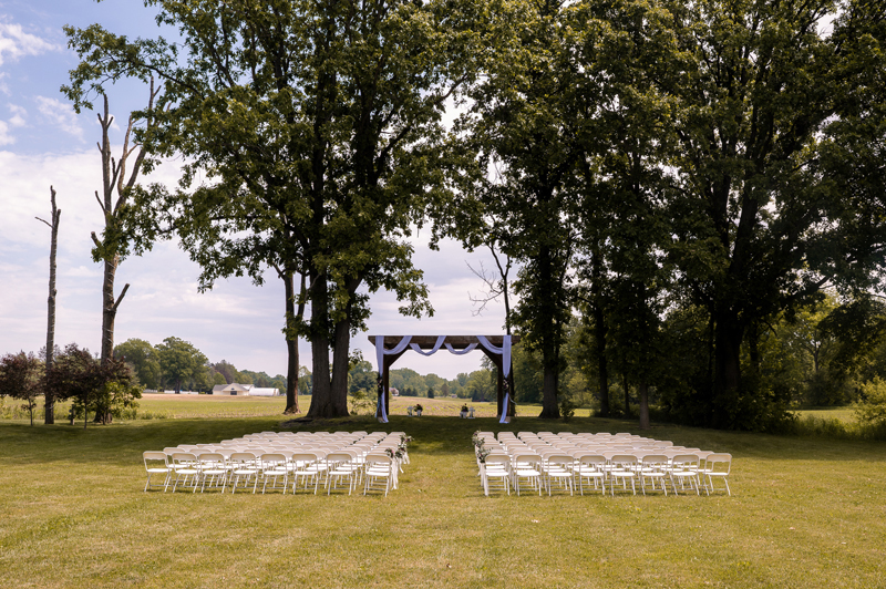 outdoor wedding ceremony at the stables