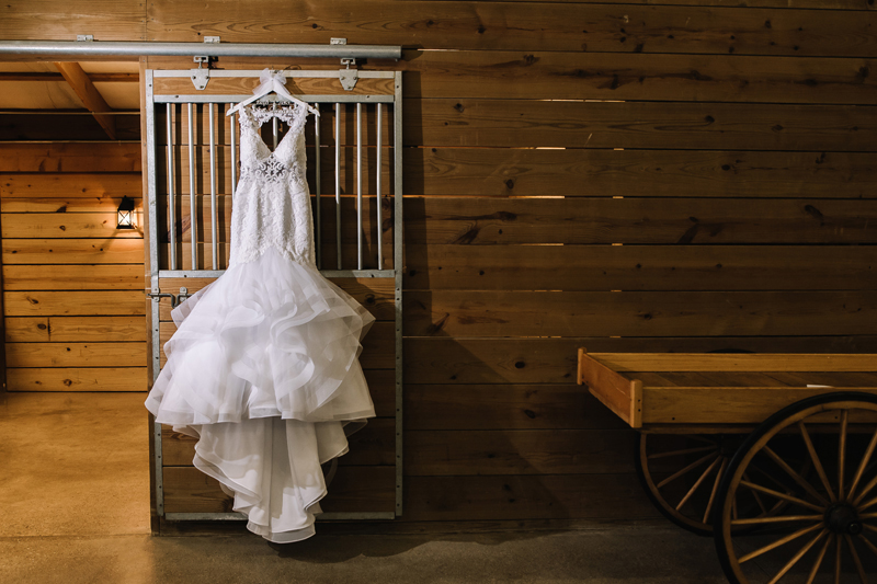 wedding-dress-hanging-at-the-stables