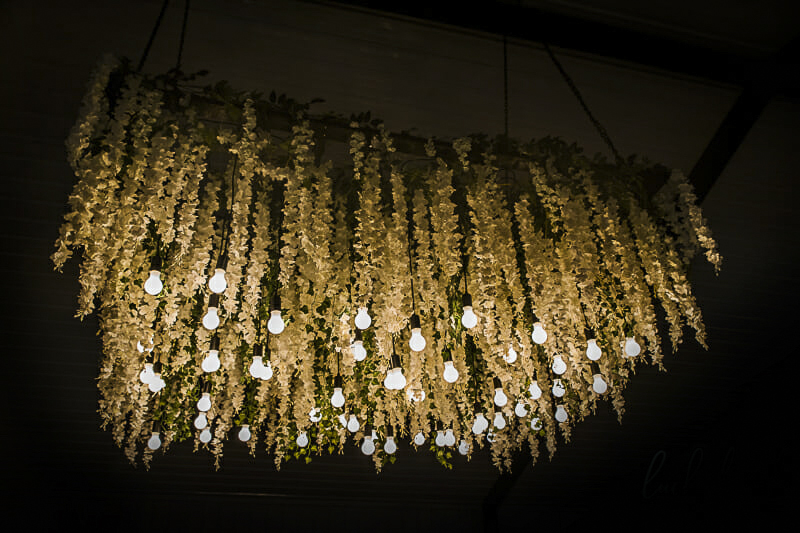 floral-chandelier-at-shady-brook-acres-wedding