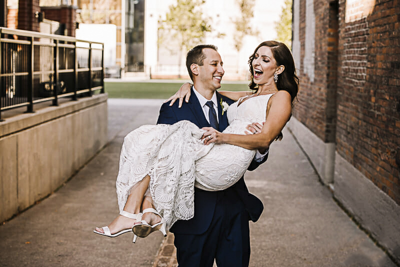cute-hensville-wedding-photo-with-groom-holding-bride