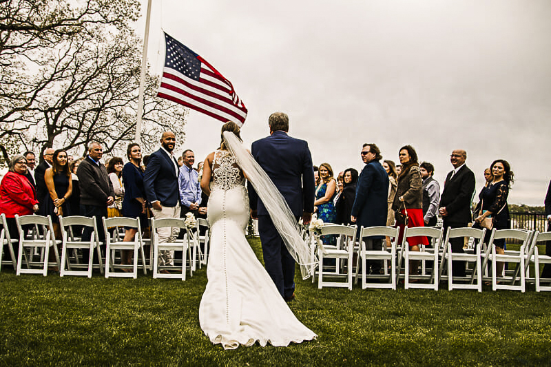 bride-walking-down-the-aisle-at-toledo-country-club-outdoor-wedding