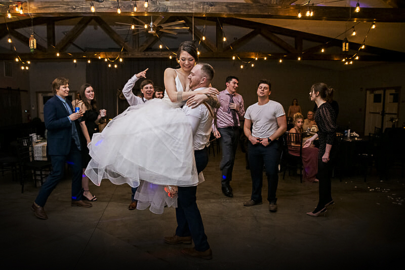 fun-photo-of-bride-and-groom-at-the-barn-at-walnut-creek-wedding