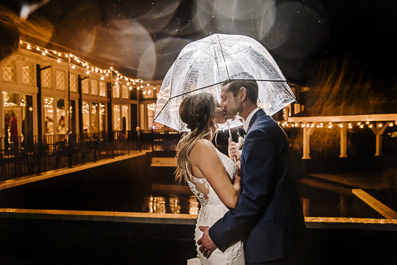 rain-umbrella-photography-at-toledo-wedding
