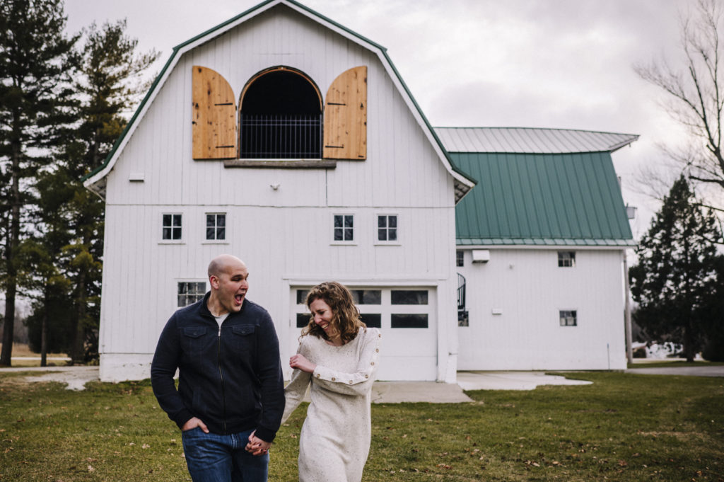 the stables white barn engagement photos