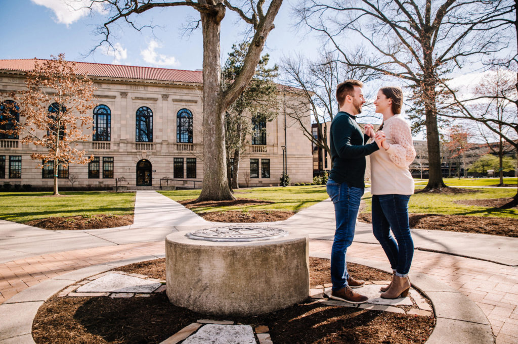 engagement photos in front of the seal BGSU