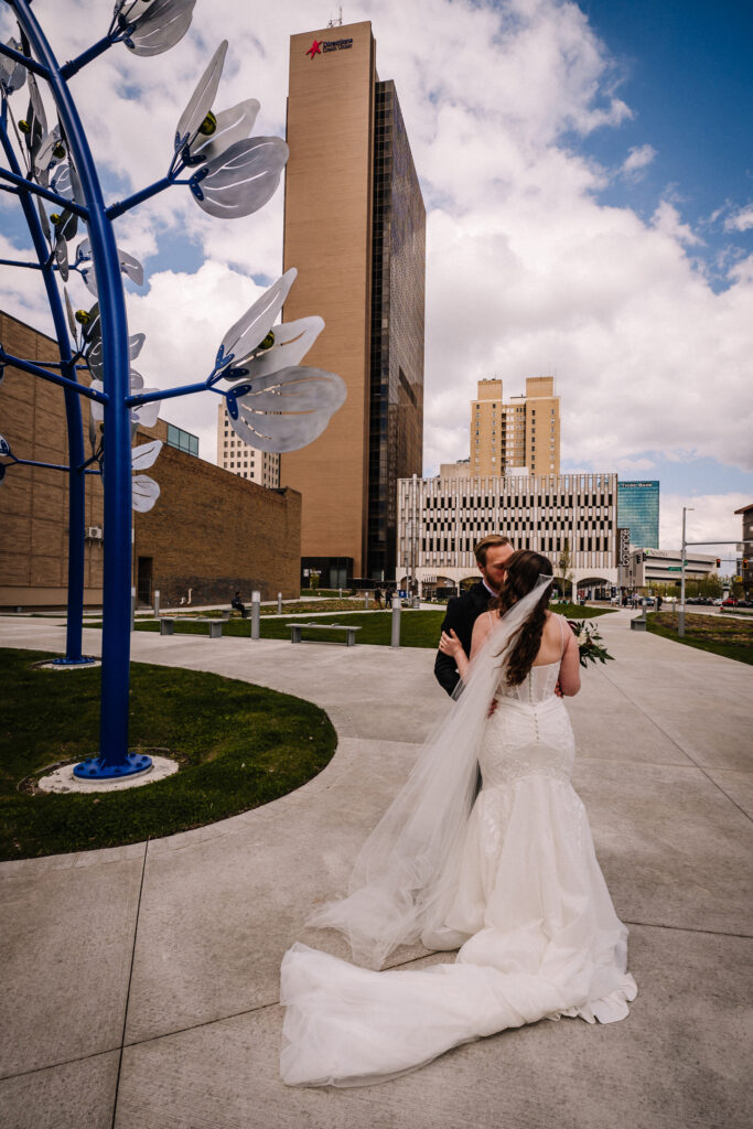 downtown toledo wedding kiss with veil