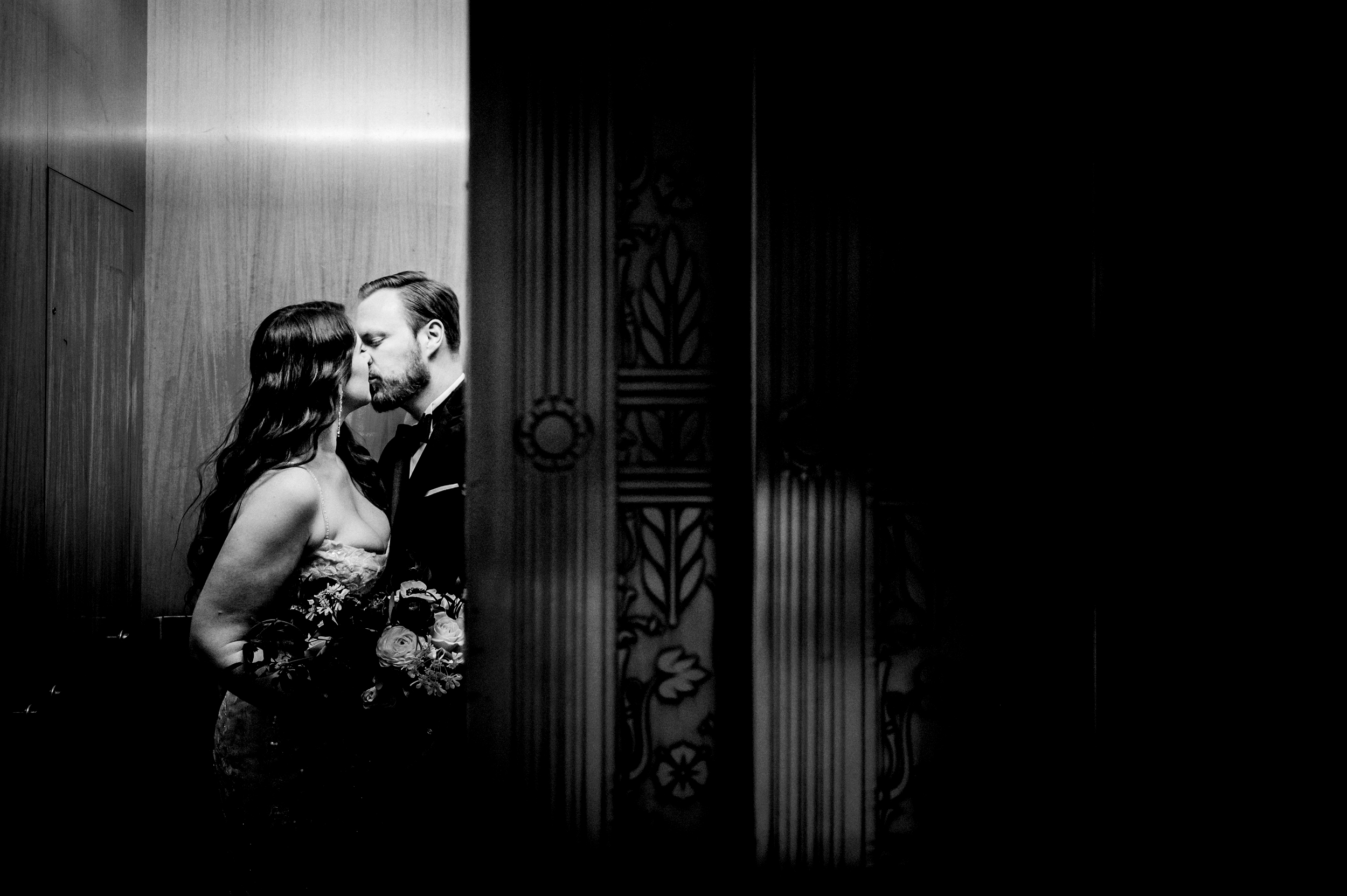 elevator kissing shot registry bistro toledo wedding