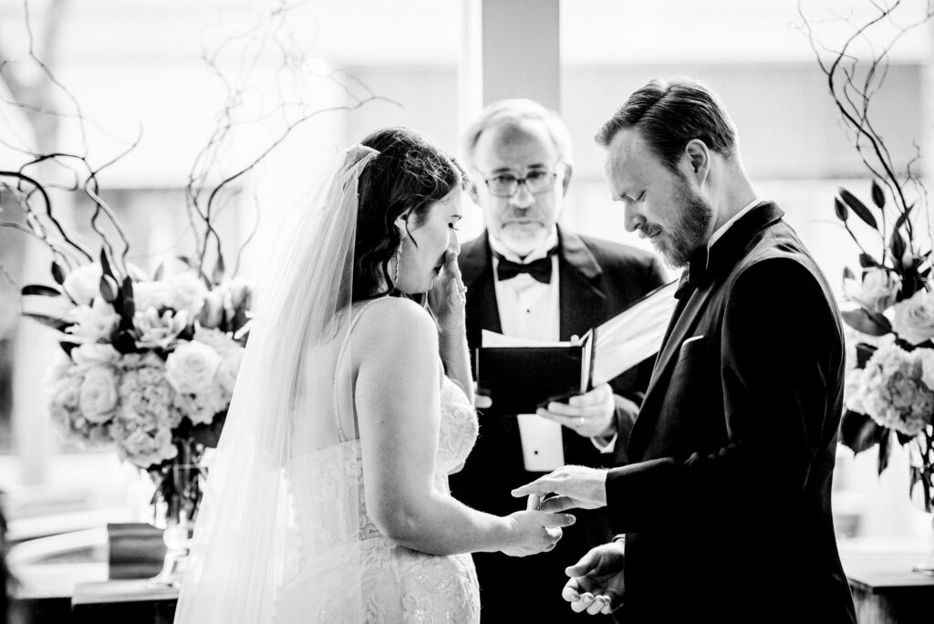 exchanging of rings at registry bistro wedding ceremony
