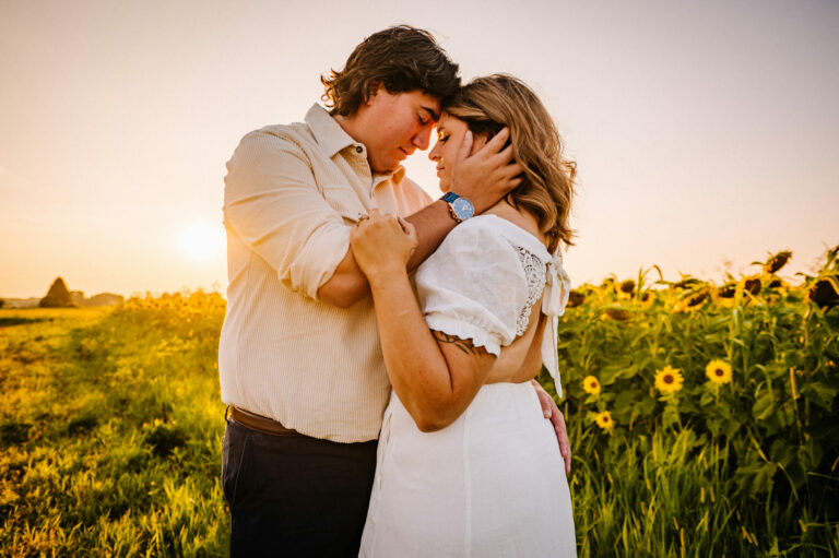 Summer engagement session in sunflower field